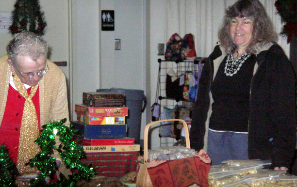 Ethel and Rhonda check out White Elephant treasures